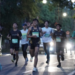 Race photo from BAUR RUN 2025