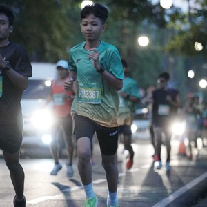 Race photo from BAUR RUN 2025