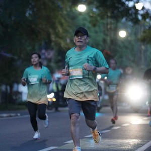 Race photo from BAUR RUN 2025