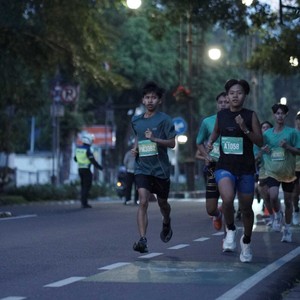 Race photo from BAUR RUN 2025