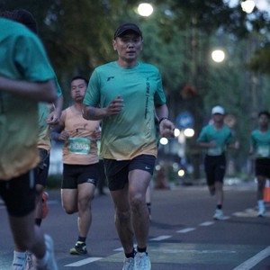 Race photo from BAUR RUN 2025