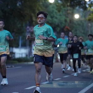 Race photo from BAUR RUN 2025