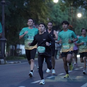 Race photo from BAUR RUN 2025
