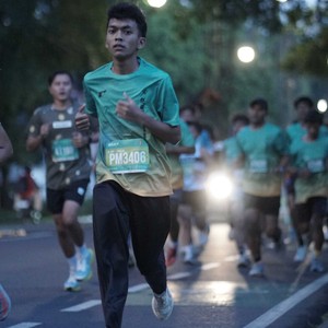 Race photo from BAUR RUN 2025