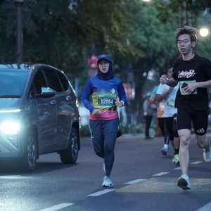 Race photo from BAUR RUN 2025