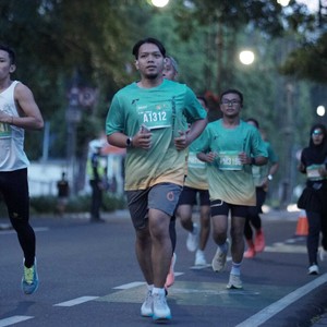Race photo from BAUR RUN 2025