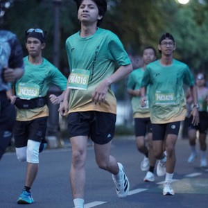 Race photo from BAUR RUN 2025