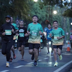 Race photo from BAUR RUN 2025