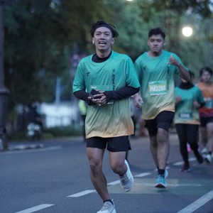 Race photo from BAUR RUN 2025