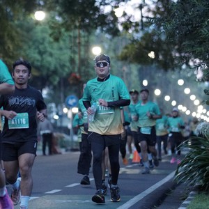 Race photo from BAUR RUN 2025