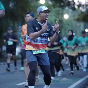 Race photo from BAUR RUN 2025
