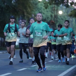 Race photo from BAUR RUN 2025