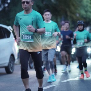Race photo from BAUR RUN 2025