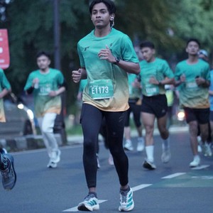 Race photo from BAUR RUN 2025