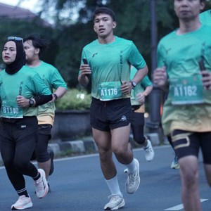 Race photo from BAUR RUN 2025