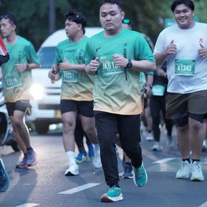 Race photo from BAUR RUN 2025