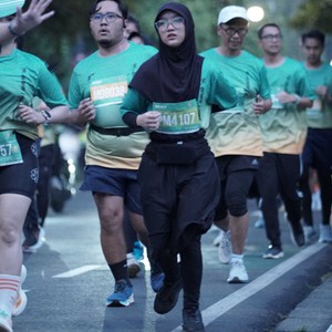 Race photo from BAUR RUN 2025