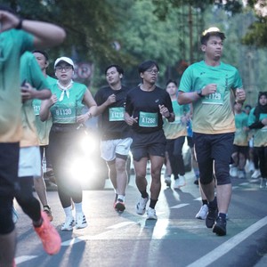 Race photo from BAUR RUN 2025