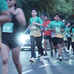Race photo from BAUR RUN 2025