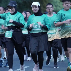 Race photo from BAUR RUN 2025