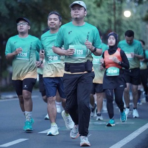 Race photo from BAUR RUN 2025