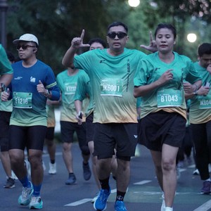 Race photo from BAUR RUN 2025