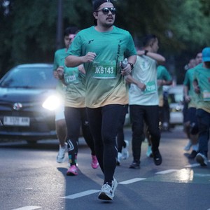 Race photo from BAUR RUN 2025