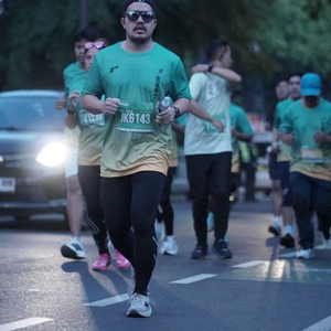 Race photo from BAUR RUN 2025