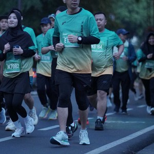 Race photo from BAUR RUN 2025