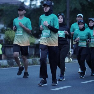 Race photo from BAUR RUN 2025
