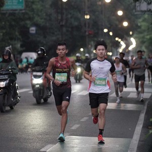 Race photo from BAUR RUN 2025