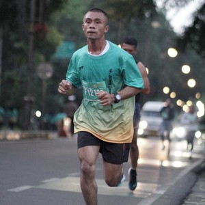 Race photo from BAUR RUN 2025