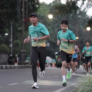Race photo from BAUR RUN 2025