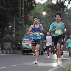 Race photo from BAUR RUN 2025
