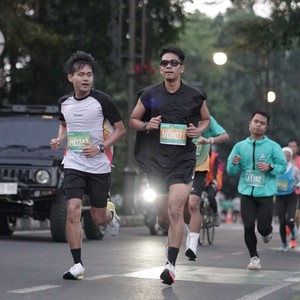 Race photo from BAUR RUN 2025