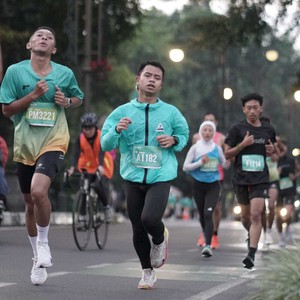 Race photo from BAUR RUN 2025