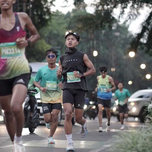 Race photo from BAUR RUN 2025