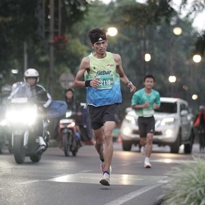 Race photo from BAUR RUN 2025