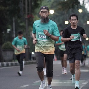 Race photo from BAUR RUN 2025