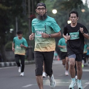 Race photo from BAUR RUN 2025