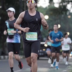 Race photo from BAUR RUN 2025