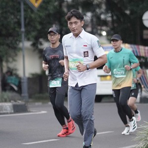 Race photo from BAUR RUN 2025