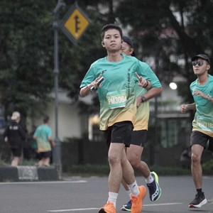 Race photo from BAUR RUN 2025