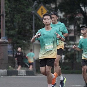 Race photo from BAUR RUN 2025