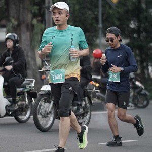 Race photo from BAUR RUN 2025