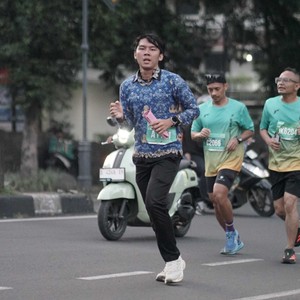 Race photo from BAUR RUN 2025