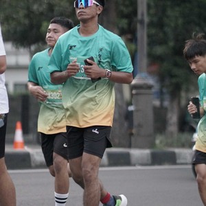 Race photo from BAUR RUN 2025