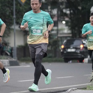 Race photo from BAUR RUN 2025