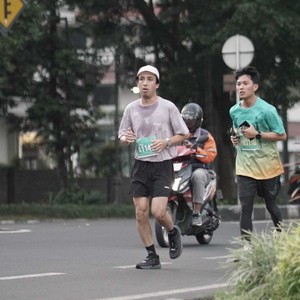 Race photo from BAUR RUN 2025