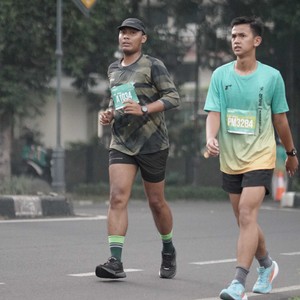 Race photo from BAUR RUN 2025